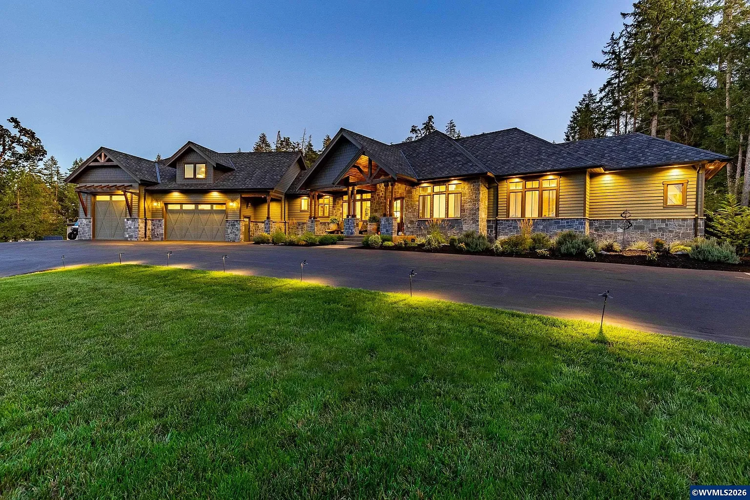 Luxury Southern Oregon home photographed at dusk for property marketing